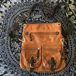Brown and leather messenger bag
