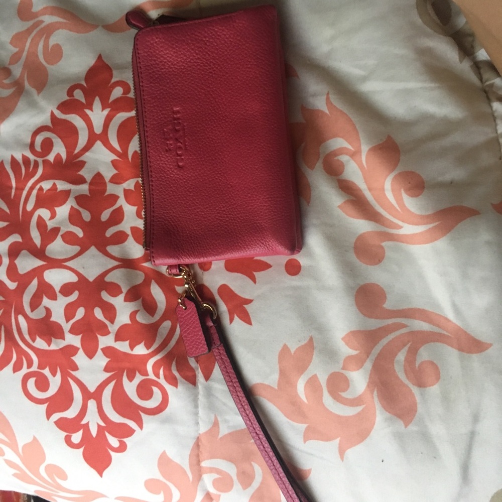 A coach hand wallet
