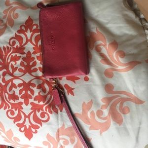 A coach hand wallet