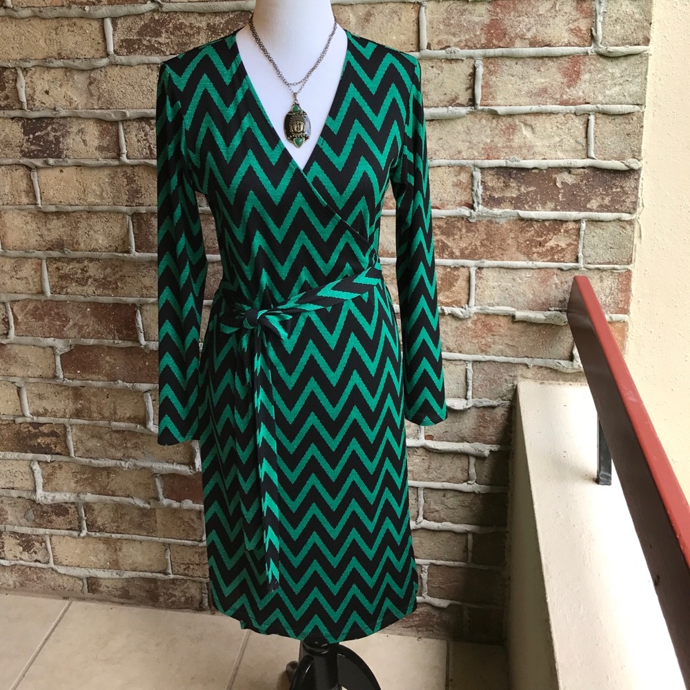 Green and black wrap dress.