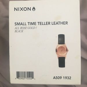 Nixon Rose gold and black leather strap watch