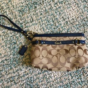 Brown and navy Coach Wristlet