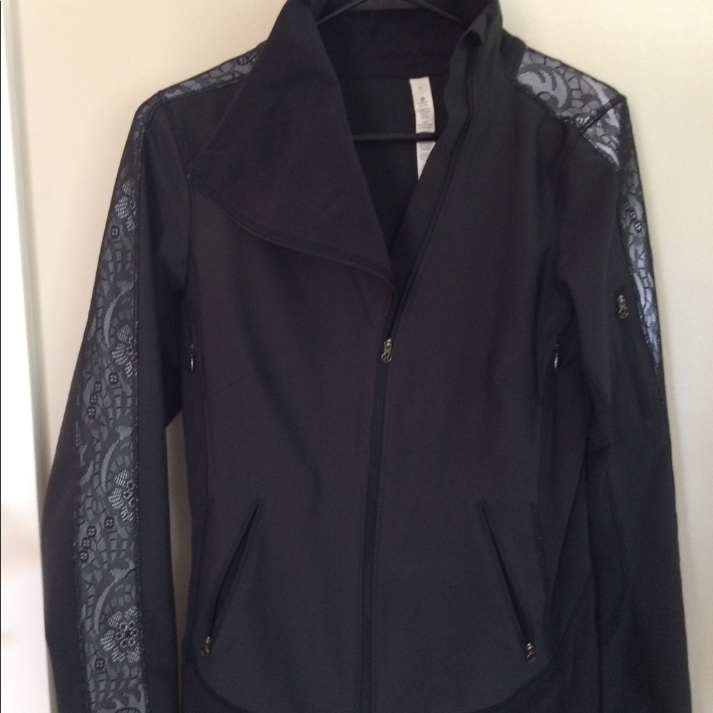 Lululemon black jacket with reflective sleeves.
