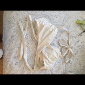 White Victoria secret wrap bathing suit top.
