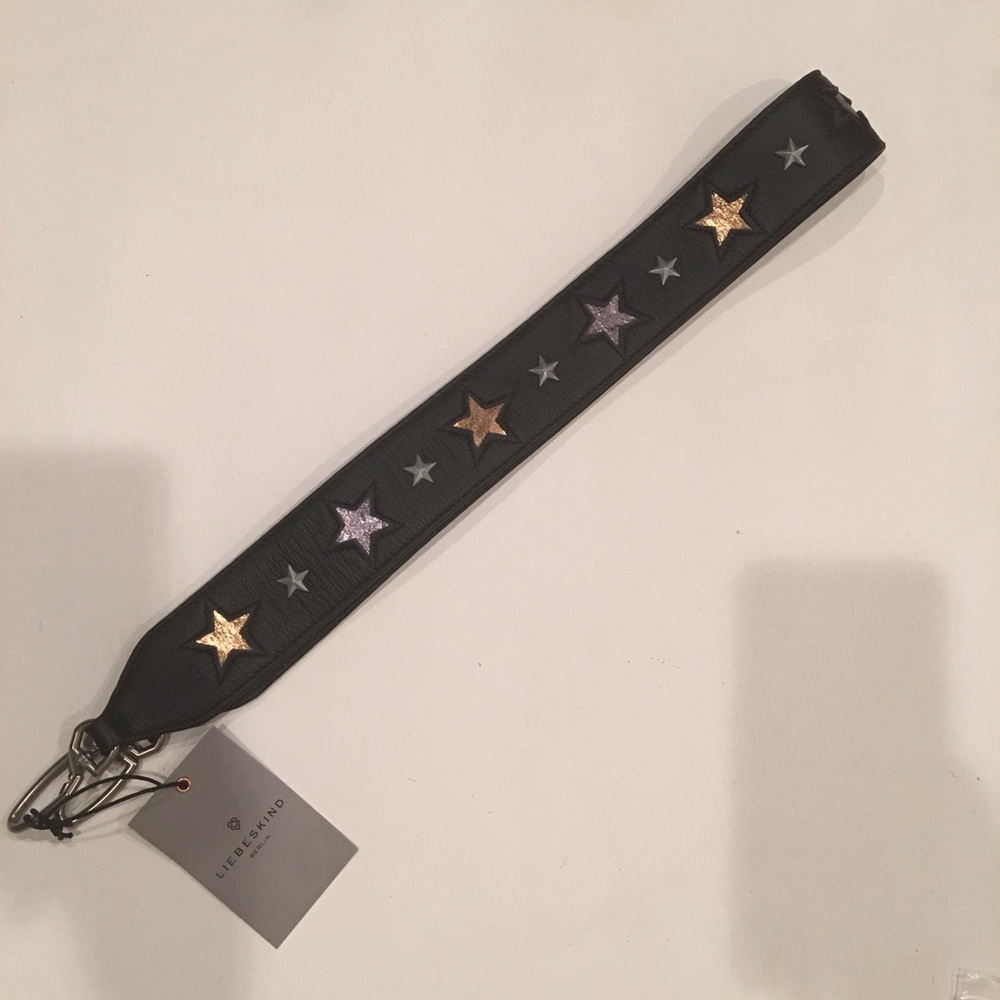 Liebeskind guitar strap/purse strap.