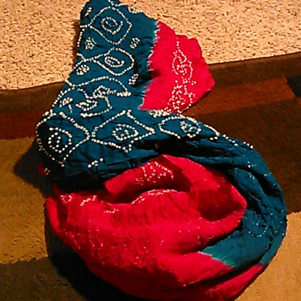 Beautiful pink and teal scarf.