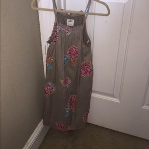 A greyish halter dress.