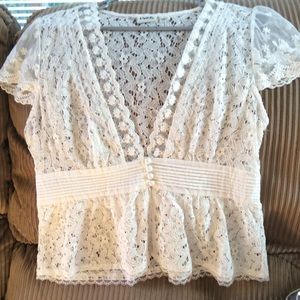 Delicate off-white lace top by Pinky.