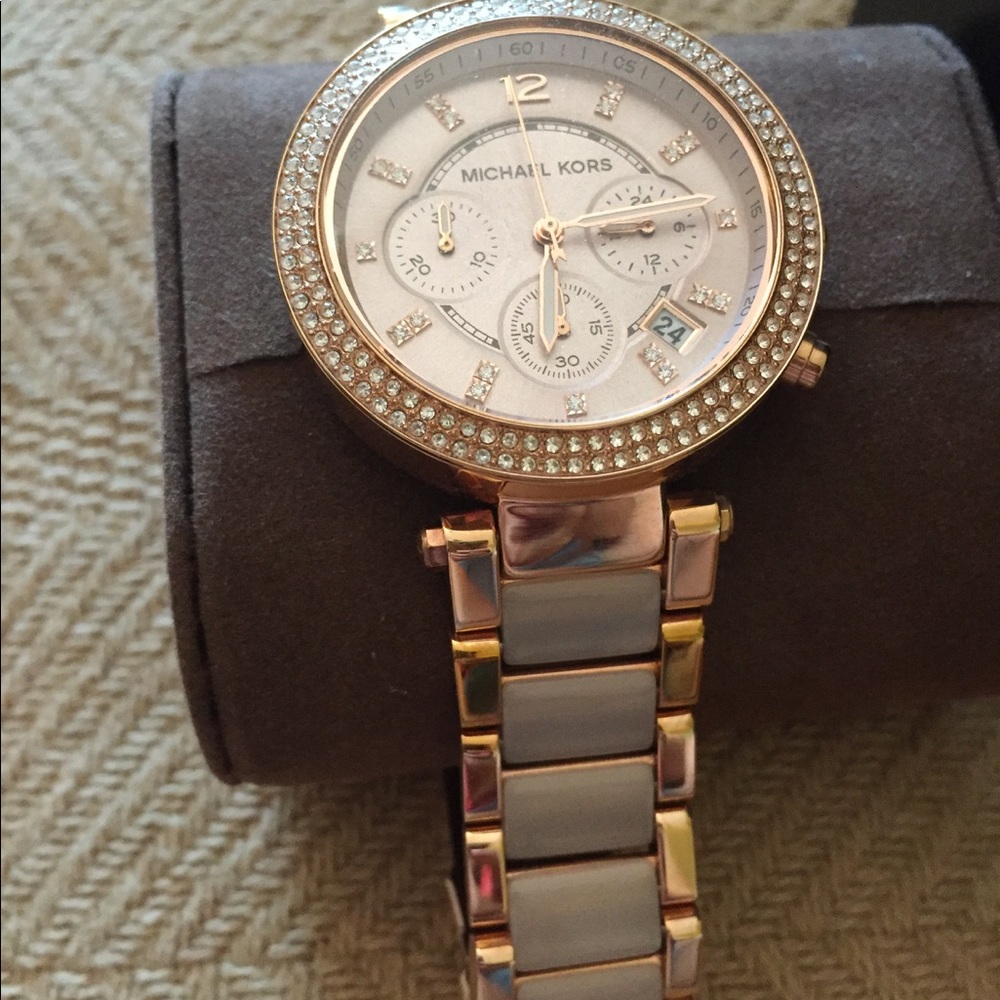 Michael Kors rose gold watch.