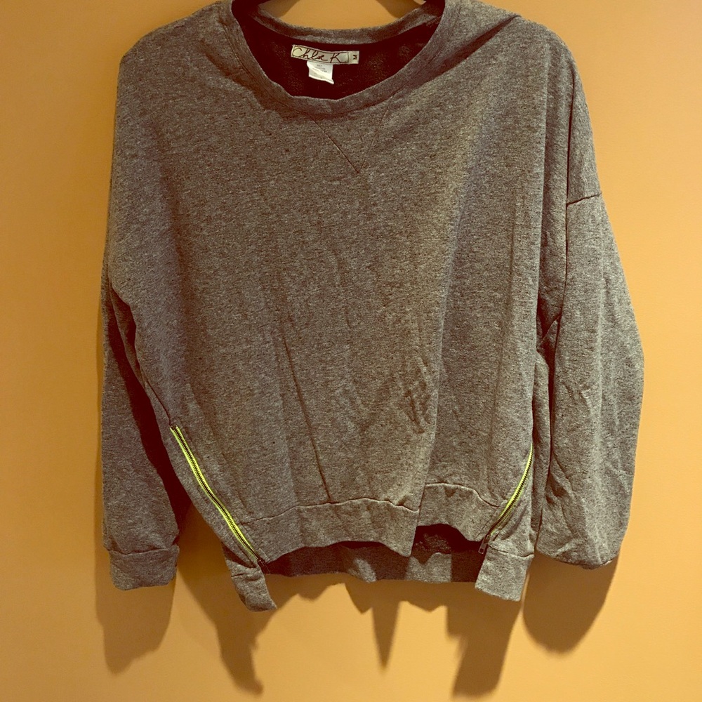 Sweater with side zippers