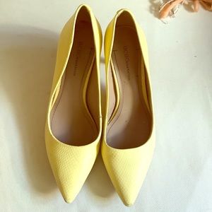 Yellow snakeskin BCBG heels
