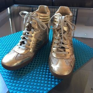 Gold coach wedge shoes