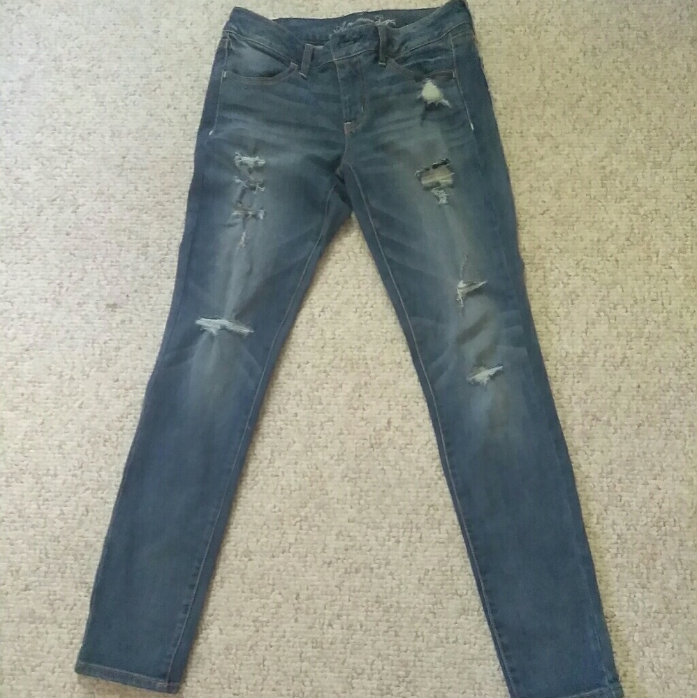 Medium wash destroyed denim