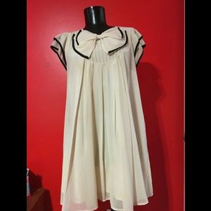 Creme baby doll dress