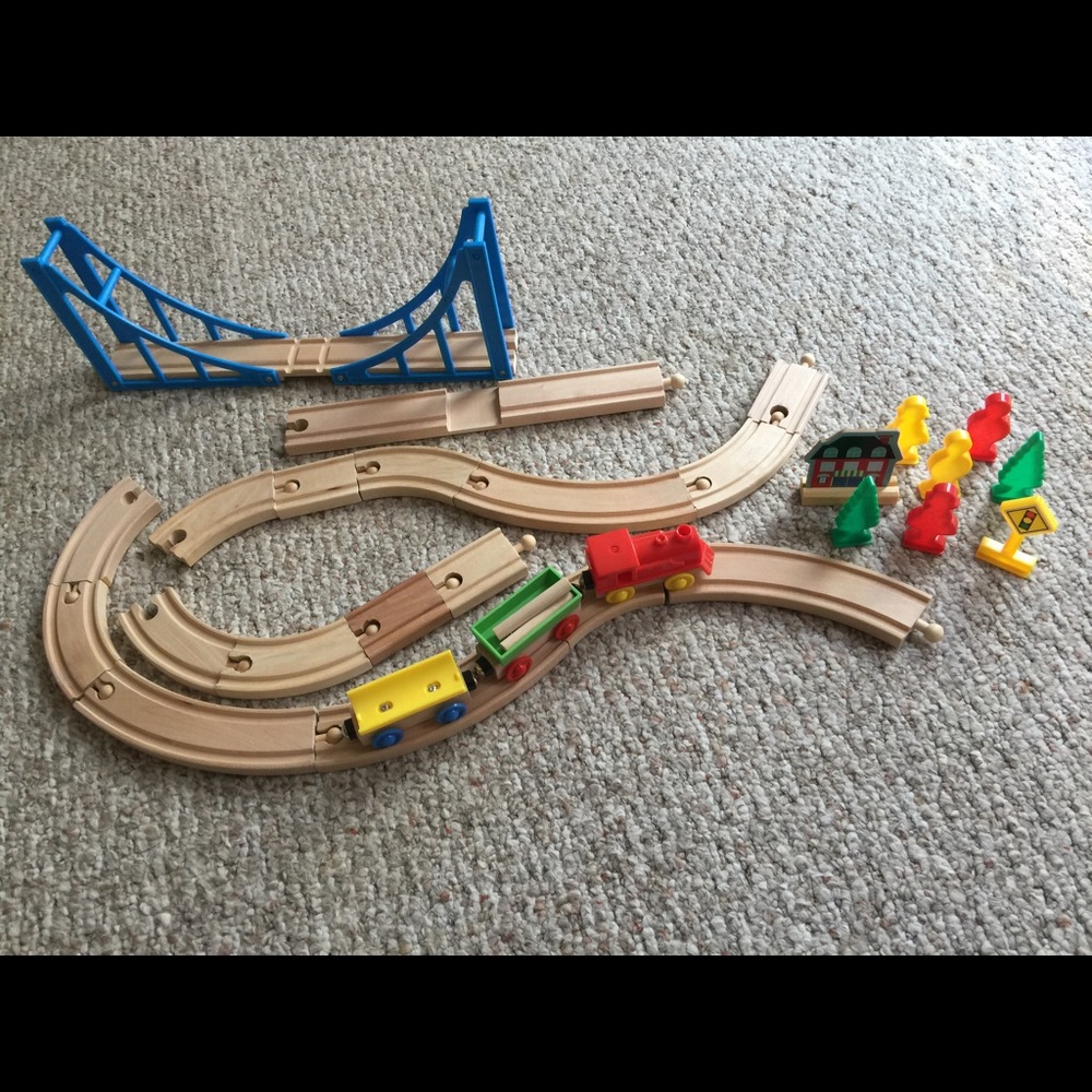 Wooden train set with train and people