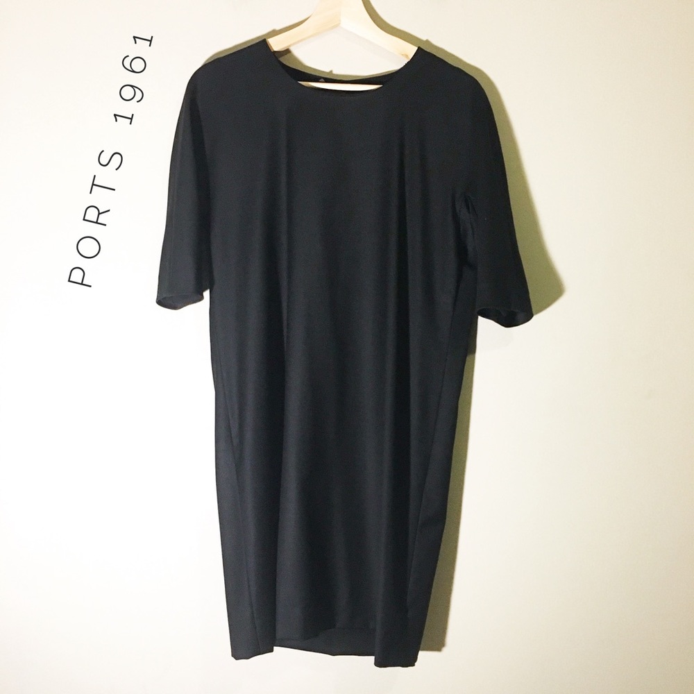 Classic black dress with beautiful draped back