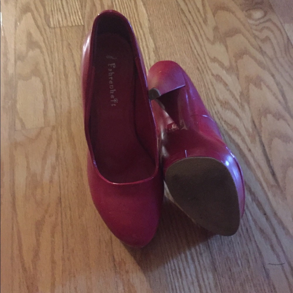 Red high pumps. Never worn