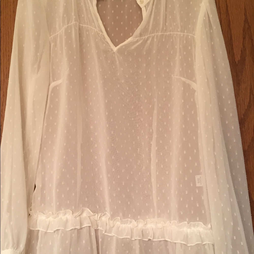 Off white see through silk shirt. Never worn