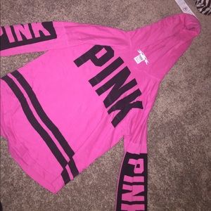 A Pink Victoria's Secret sweatshirt.