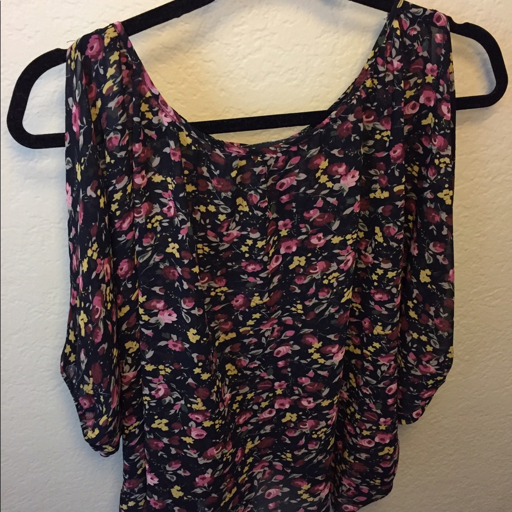 Floral top with shoulder cutouts