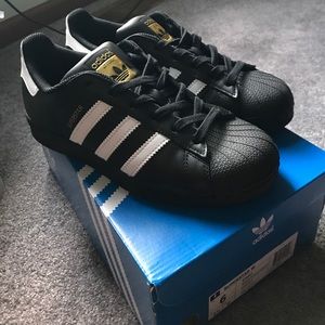 Black Adidas Superstars