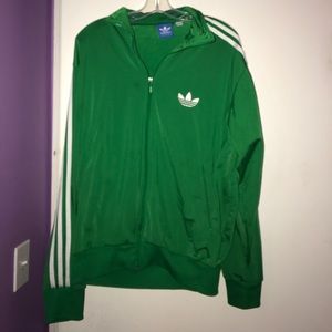 white adidas jacket with green stripe
