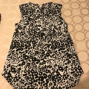 Black and white leopard printed sleeveless top.