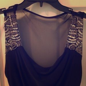 B. Darlin Poly/Spandex LBD.