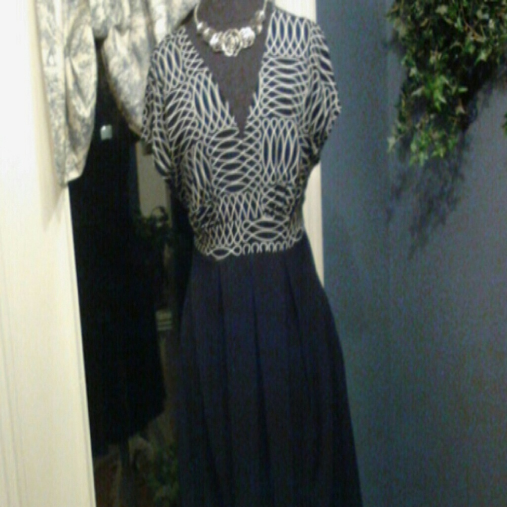 This cute little dress will be a favorite !