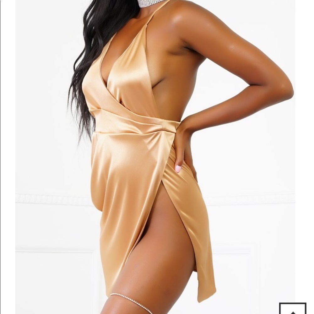 Gold satin mini high split open back dress.
