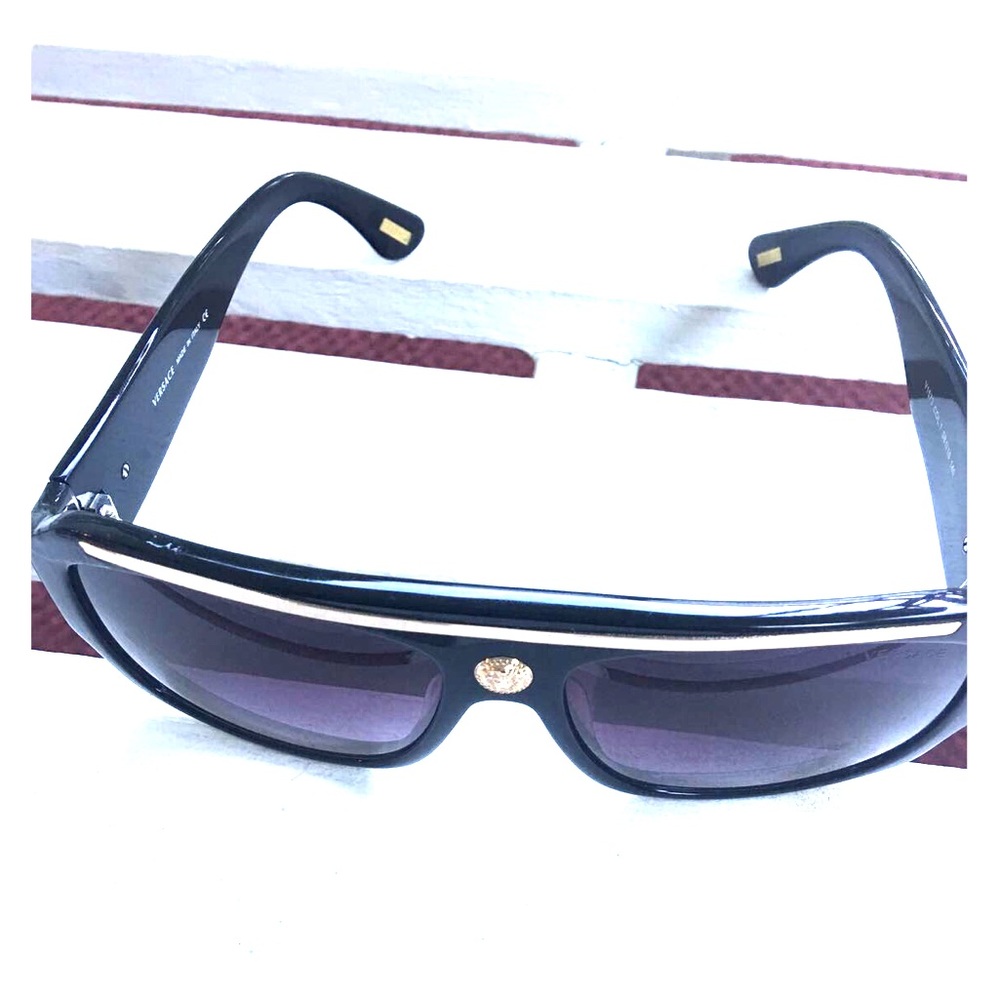 Authentic black and gold Versace sunglasses.