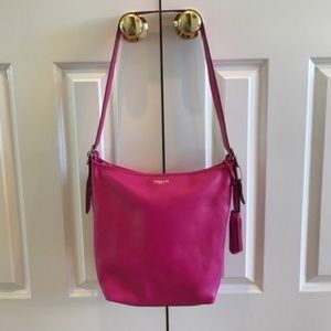 Hot pink coach bag with tassels