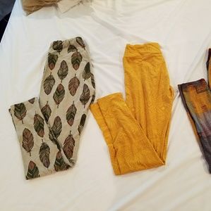 Lularoe feather leggings on left