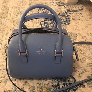 Brand new, never been carried Kate Spade