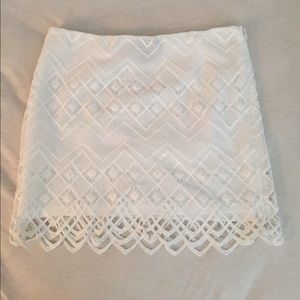 White skirt with lace outer layer
