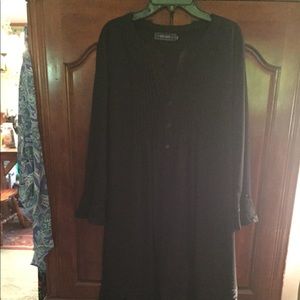 Black dress bought to wear with cowboy boots.