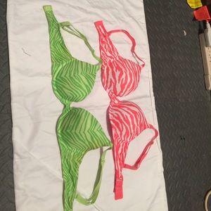 Two VS Pink bras.