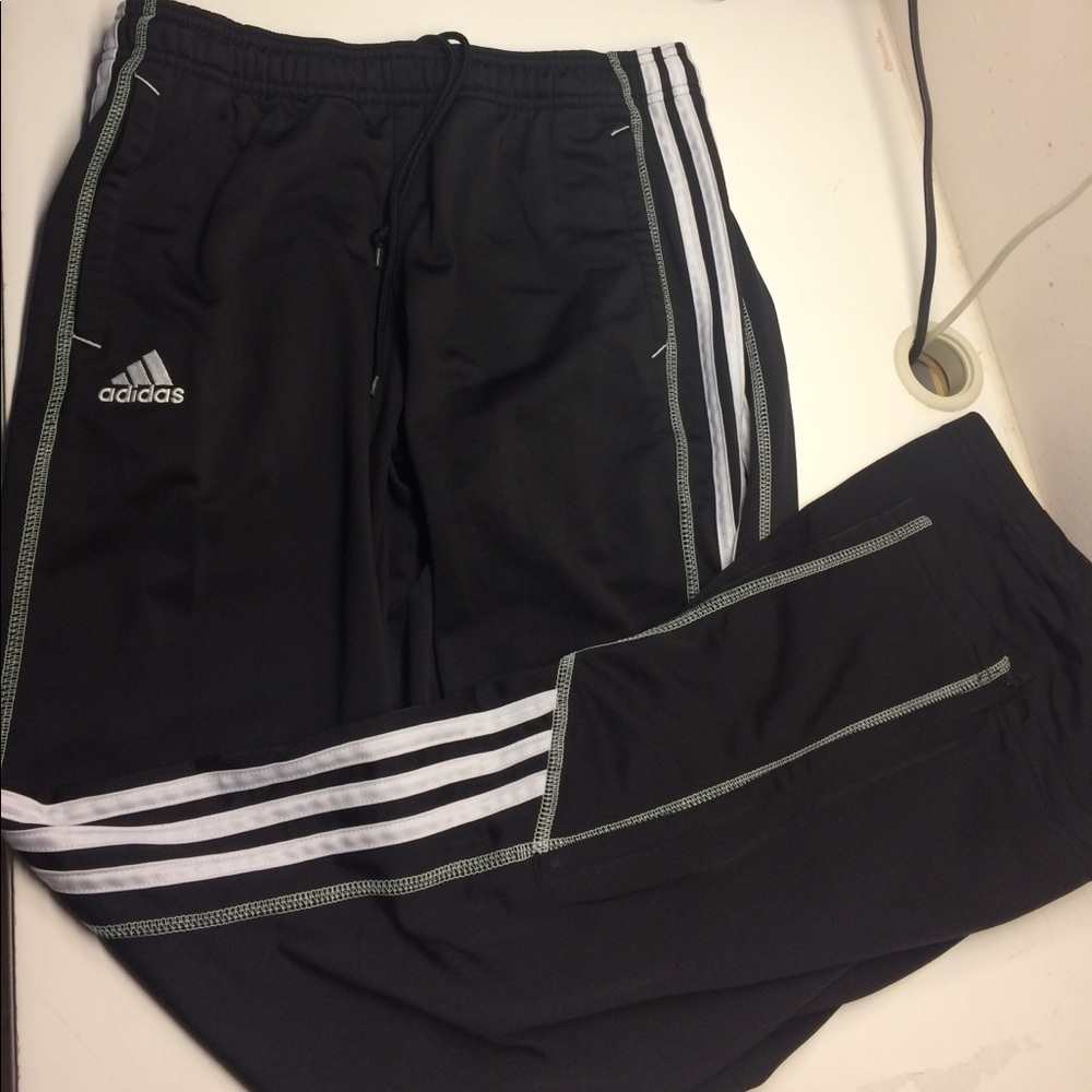 Black and white adidas track pants
