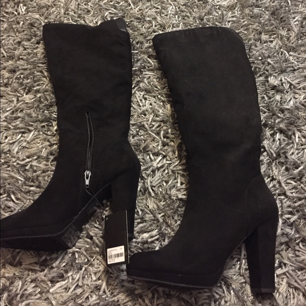 Black over-the-knee boots.  New w tags.