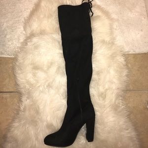 Over-the-knee black suede heeled boots
