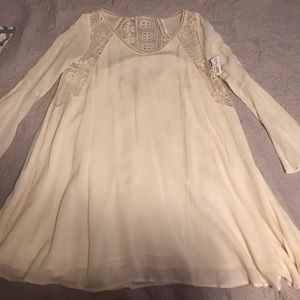 Beautiful creme long sleeved dress