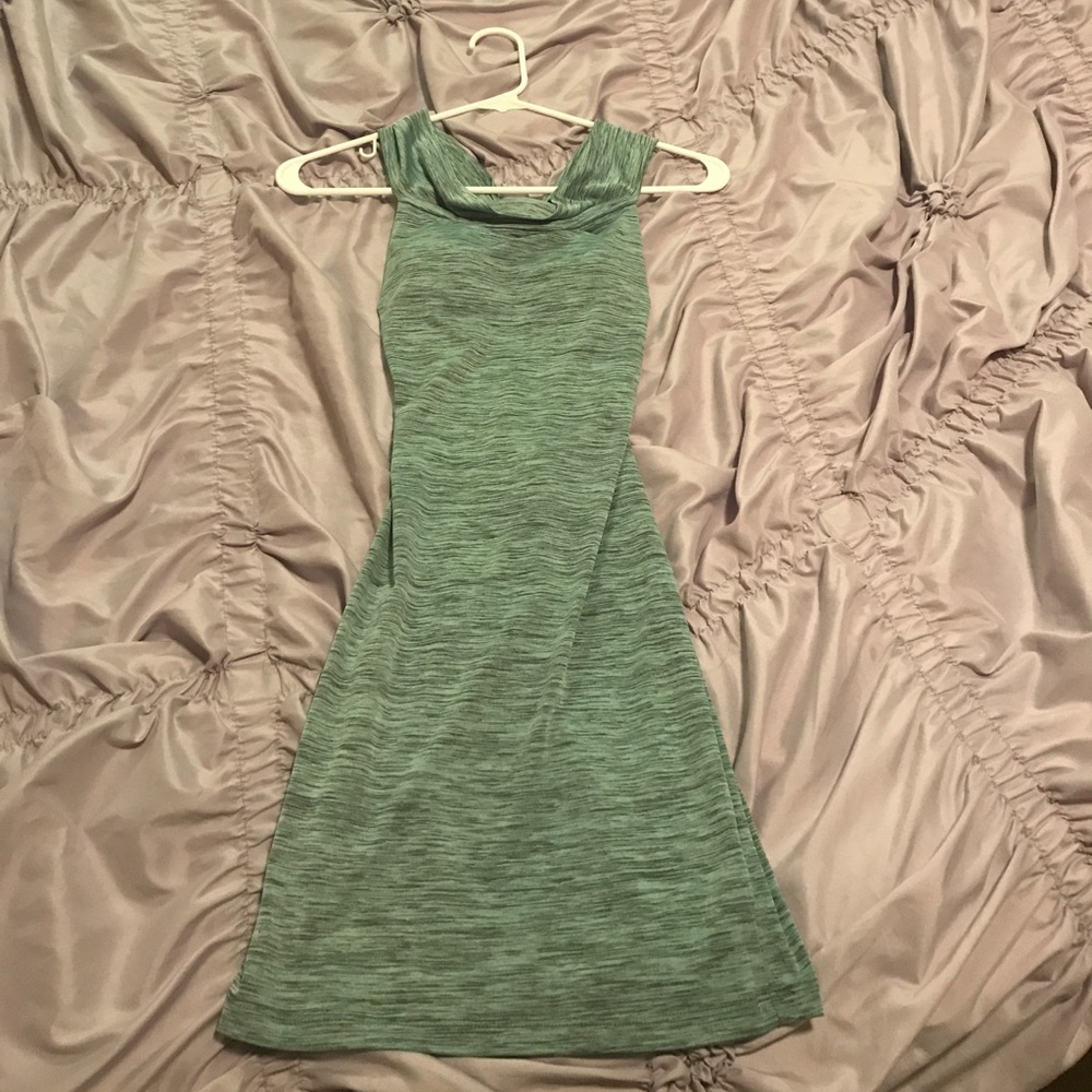 Light teal fitted dress with open criss cross back