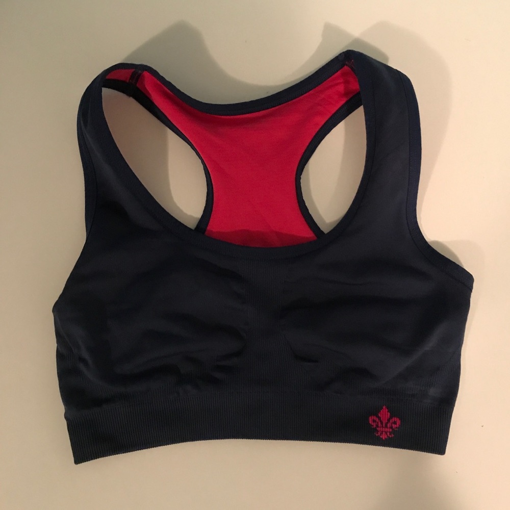 Reversible pink and blue sports bra