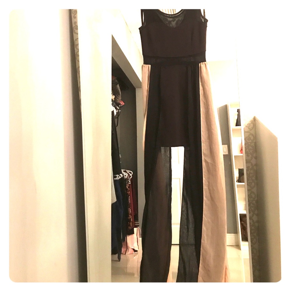 Black mini dress with flowy side pieces