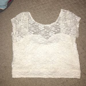 Has an open back & a bow in the back.