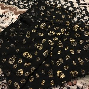 Black scarf with gold printed skulls