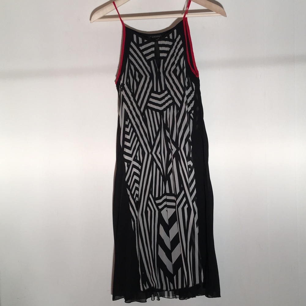 Semi sheer black and white Komarov dress.