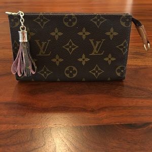 Louis Vuitton bucket PM monogram pouch/clutch