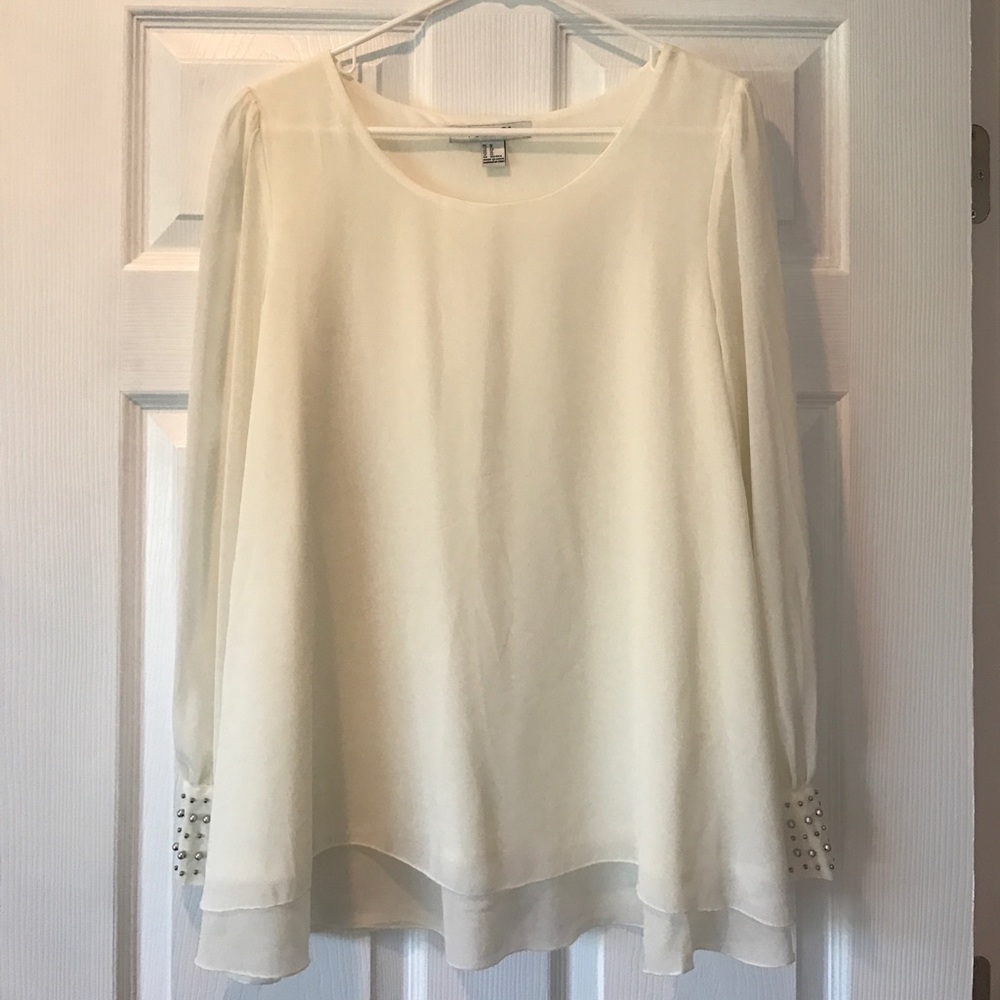 Cream Forever 21 top with silver cuff detail