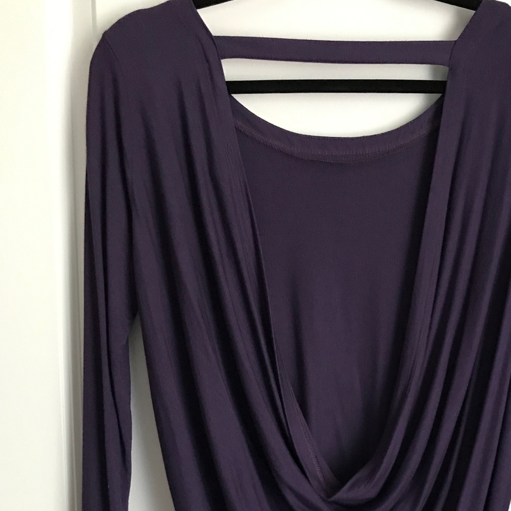 Purple blouse with low-cute, open back